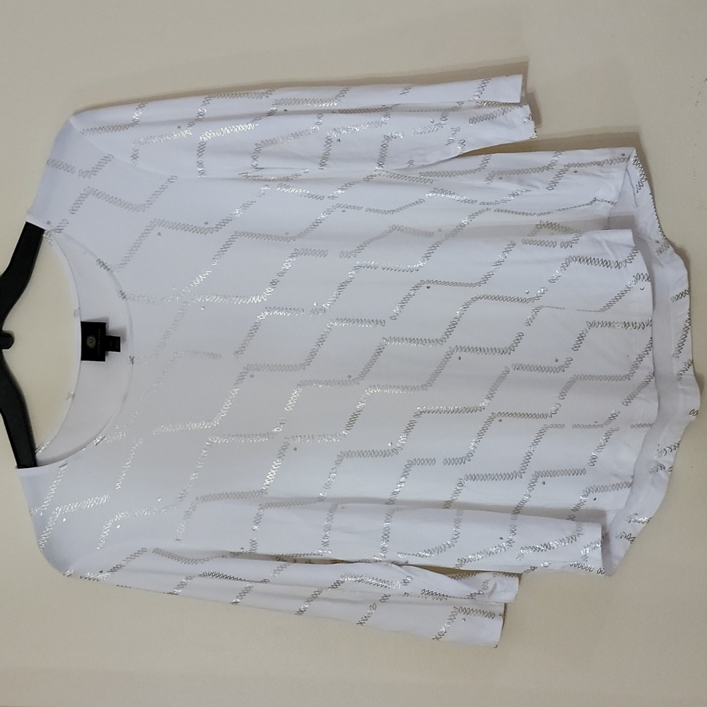 White top with gold designs